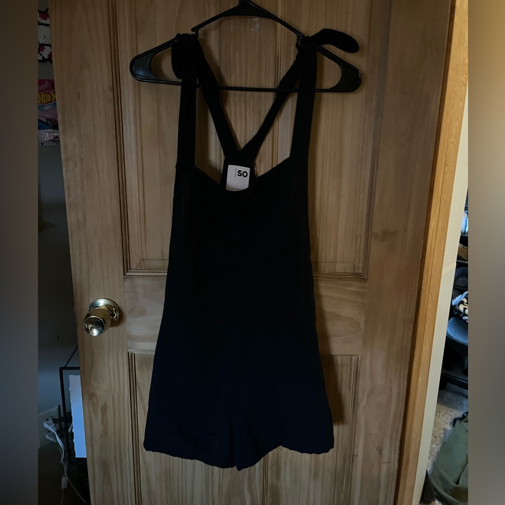 black fabric overalls